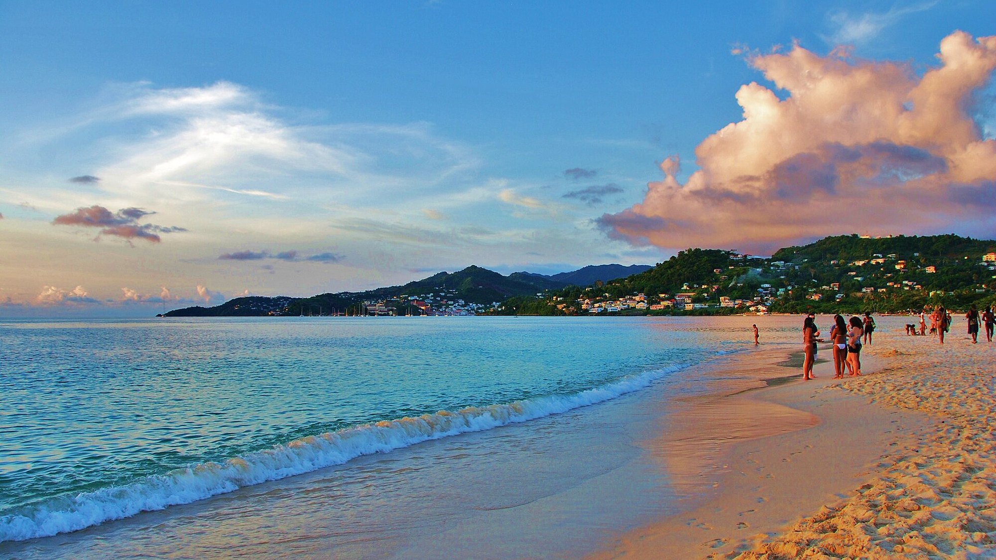 Grand Anse Beach, Grenada — turquoise shallows, pale sand and green hills behind